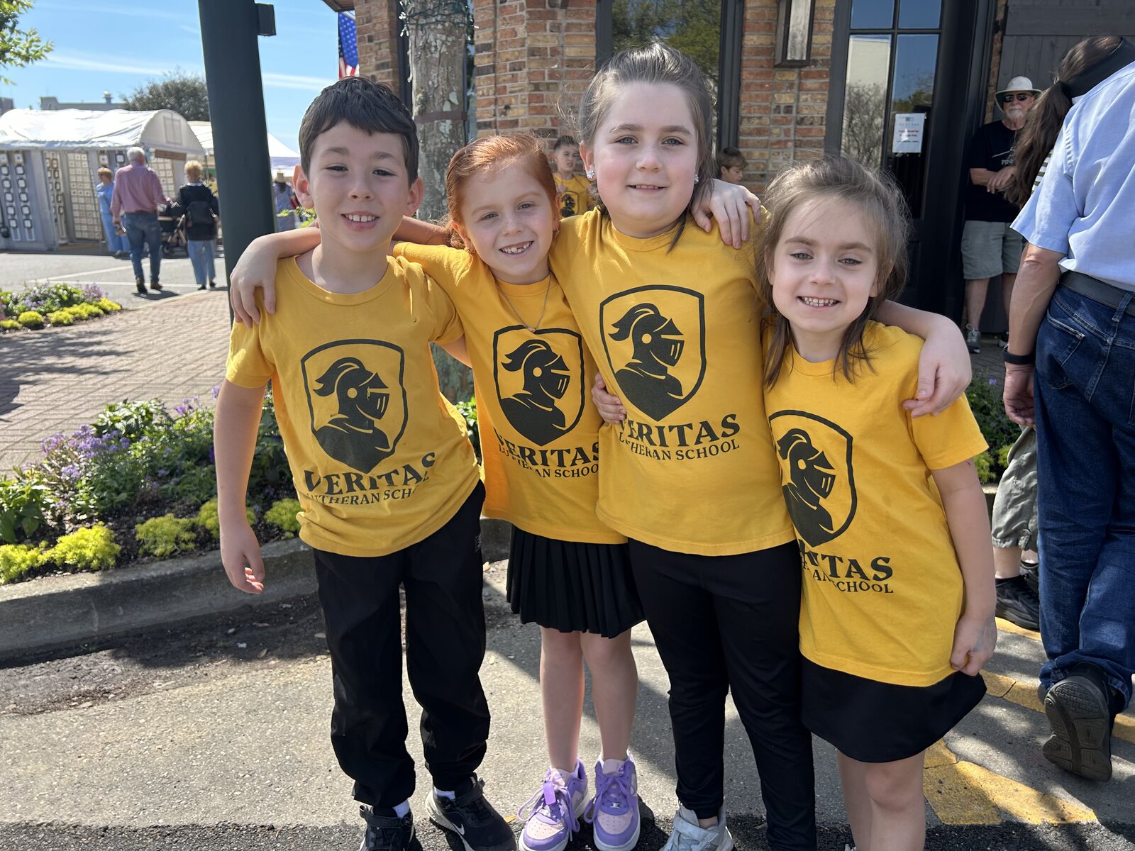 Veritas students together at a Fairhope community event